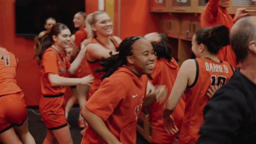 a group of female basketball players including number 17