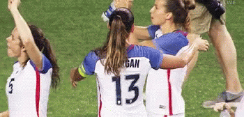 A Group Of Female Soccer Players Including Number 13 GIF