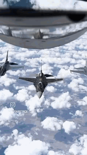 A Group Of Fighter Jets Are Flying Through The Clouds With The Words Corsairforce On The Bottom GIF