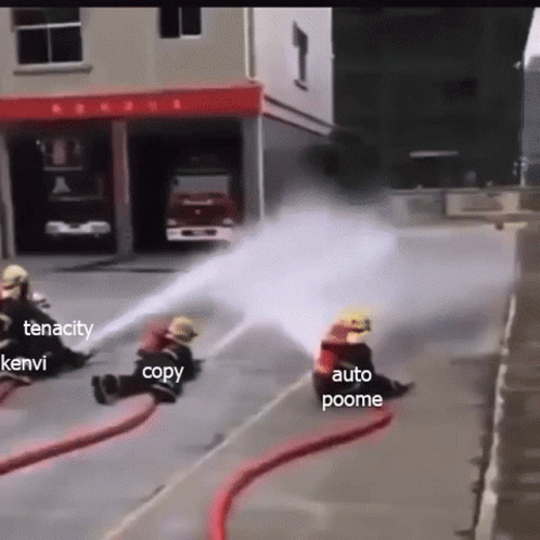 A Group Of Firefighters Are Spraying Water From A Fire Hose GIF