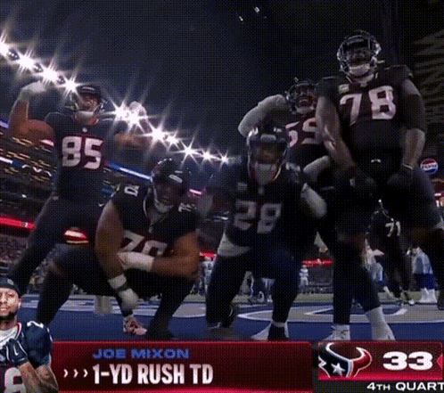 A Group Of Football Players Are Dancing In Front Of A Scoreboard That Says 1 Yd Rush Td GIF