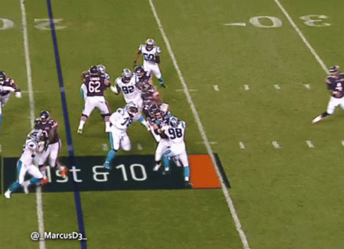 A Group Of Football Players Are Playing On A Field With An Arrow Pointing To The Left And Right GIF