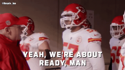 A Group Of Football Players Are Standing In A Locker Room And One Of Them Says Yeah We 'Re About Ready Man GIF