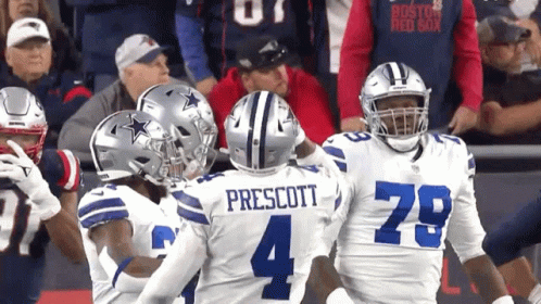 A Group Of Football Players Including One Named Prescott GIF