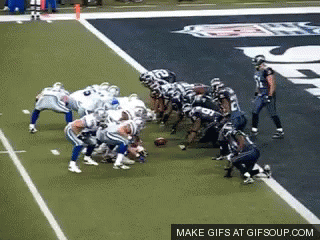 A Group Of Football Players On A Field With A Make Gifs At Gifsoup.com Logo GIF