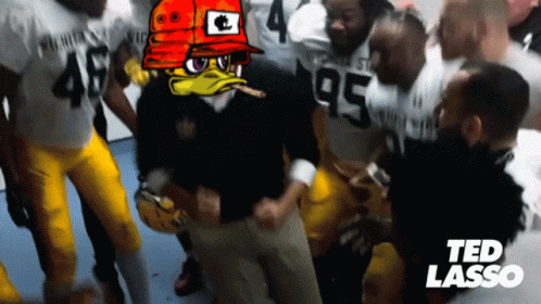 A Group Of Football Players With The Number 95 On Their Shirts GIF