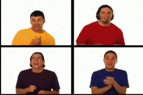 A Group Of Four Men Are Standing Next To Each Other GIF