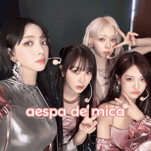 A Group Of Girls Posing For A Picture With The Words Aespa De Mica On The Bottom Right GIF