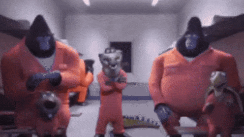 A Group Of Gorillas In Orange Jumpsuits Are Holding Guns GIF