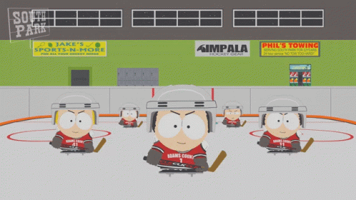 A Group Of Hockey Players Are On A Ice Rink In Front Of A Sign That Says Phil 'S Towing GIF