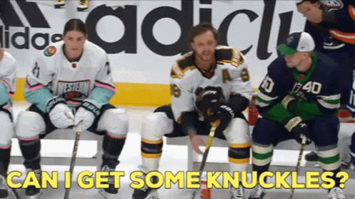 A Group Of Hockey Players Sitting On The Ice With The Words Can I Get Some Knuckles Written On The Bottom GIF
