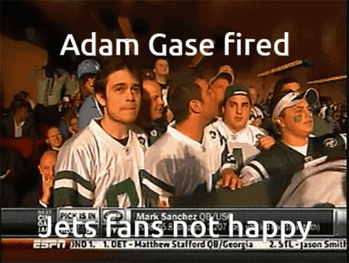 A Group Of Jets Fans Are Watching A Game With The Caption Adam Gase Fired GIF