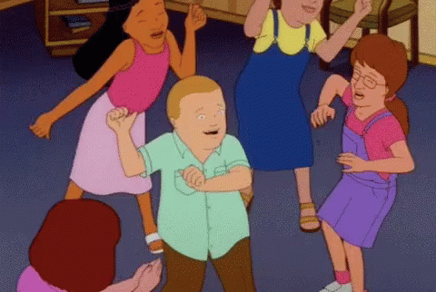 A Group Of Kids Are Dancing In A Room With A Boy In The Middle GIF