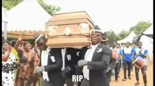 A Group Of Men Are Carrying A Coffin With The Word Rip On It . GIF