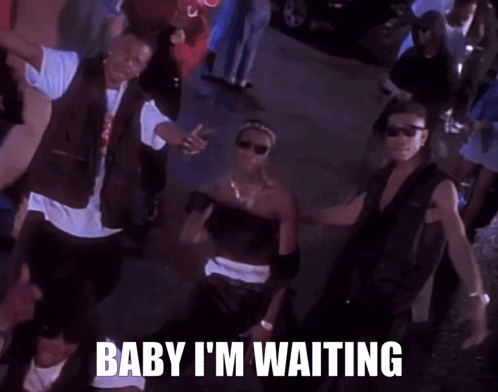 A Group Of Men Are Dancing In A Crowd With The Words Baby I 'M Waiting Above Them GIF