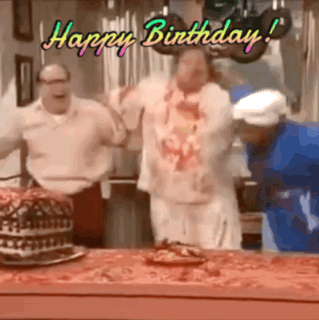 A Group Of Men Are Dancing In Front Of A Birthday Cake With The Words Happy Birthday Written Above Them GIF