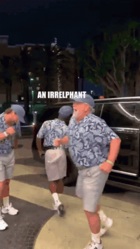 A Group Of Men Are Dancing In Front Of A Car And The Caption Reads " An Irrelevant " GIF
