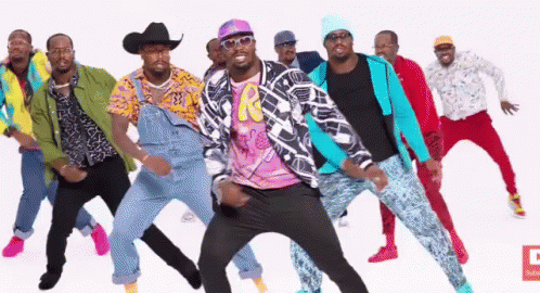 A Group Of Men Are Dancing Together In A Video . GIF