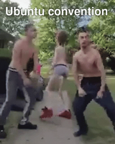 A Group Of Men Are Dancing With The Words Ubuntu Convention Above Them GIF