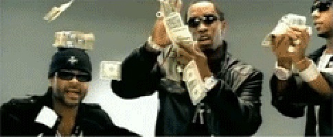 A Group Of Men Are Holding Up Lots Of Money GIF