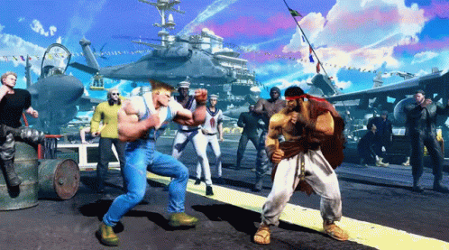 A Group Of Men Are Playing A Video Game In Front Of A Large Military Ship GIF