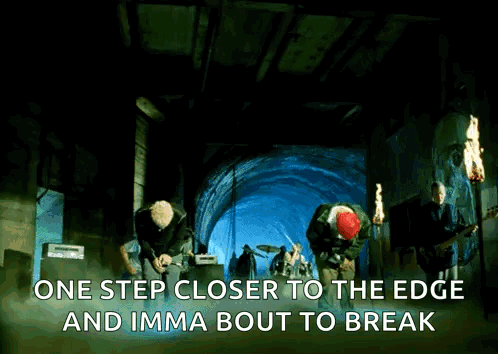 A Group Of Men Are Playing Instruments In A Dark Tunnel With The Words One Step Closer To The Edge And Imma Bout To Brea GIF