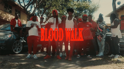 A Group Of Men Are Posing For A Picture With The Words Blood Walk Written In Red GIF