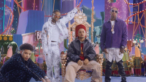 A Group Of Men Are Posing In Front Of A Sign That Says B & J GIF