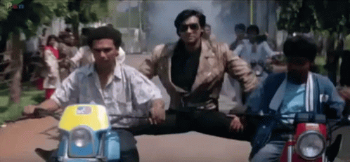 A Group Of Men Are Riding Motorcycles Down A Street With The Word Pen In The Corner GIF