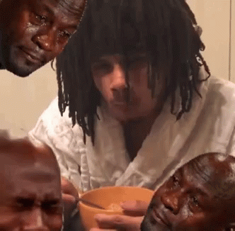 A Group Of Men Are Sitting Around A Bowl Of Soup And One Man Is Crying GIF