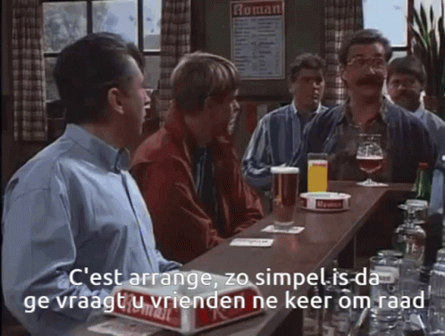 a group of men are sitting at a bar with a sign that says roman on it