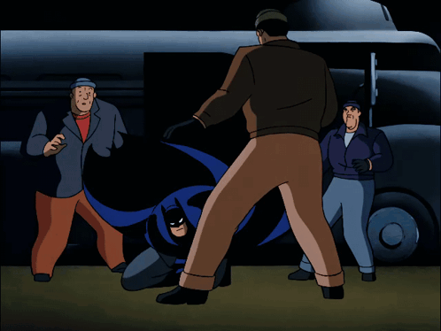a group of men are standing around a cartoon character
