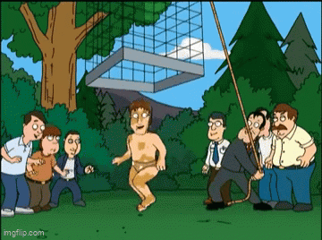 A Group Of Men Are Standing Around A Man In A Bathing Suit . GIF