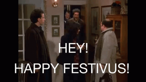 A Group Of Men Are Standing In A Living Room Talking To Each Other And The Words `` Hey ! Happy Festivus ! '' GIF
