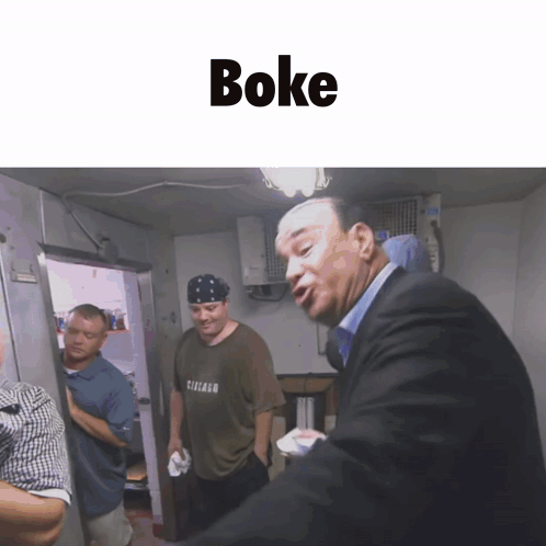 a group of men are standing in a room with the word boke on the bottom