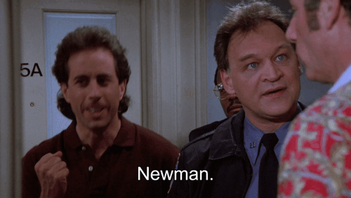 A Group Of Men Are Standing In Front Of A Door That Says 5A GIF