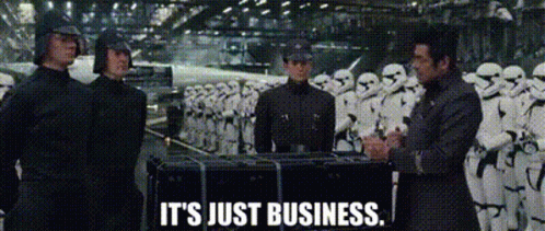 A Group Of Men Are Standing In Front Of A Row Of Stormtroopers And Talking To Each Other . GIF