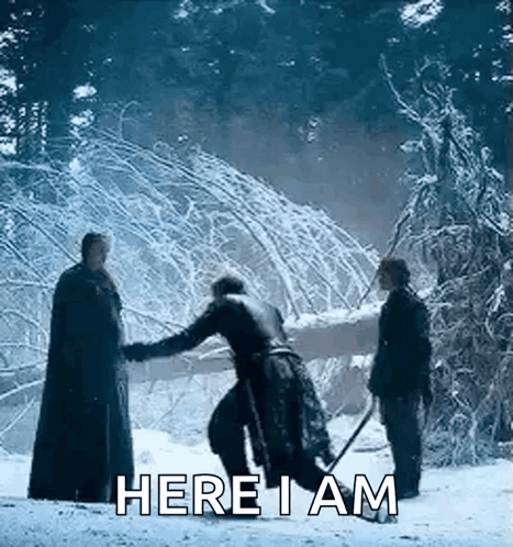 A Group Of Men Are Standing In The Snow And One Of Them Is Holding A Sword And Says `` Here I Am '' . GIF