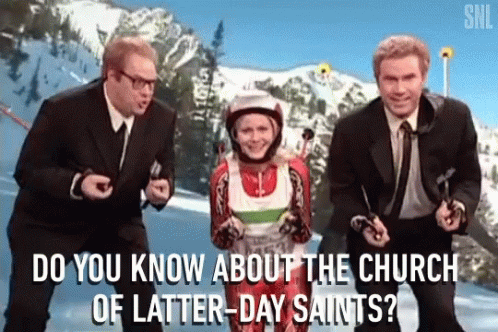 A Group Of Men Are Standing Next To A Woman In A Ski Suit And Asking Her About The Church Of Latter-Day Saints GIF
