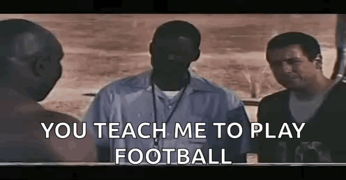 A Group Of Men Are Standing Next To Each Other And One Of Them Is Talking To The Other . GIF