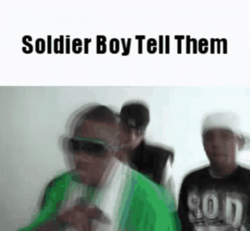 A Group Of Men Are Standing Next To Each Other And The Words `` Soldier Boy Tell Them '' Are On The Screen . GIF