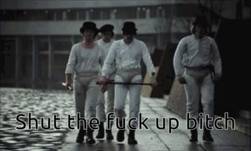 A Group Of Men Are Walking Down A Sidewalk With The Words Shut The Fuck Up Bitch Written On The Bottom GIF