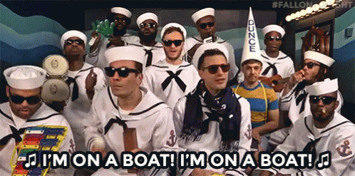 A Group Of Men Dressed As Sailors With The Words I 'M On A Boat Below Them GIF