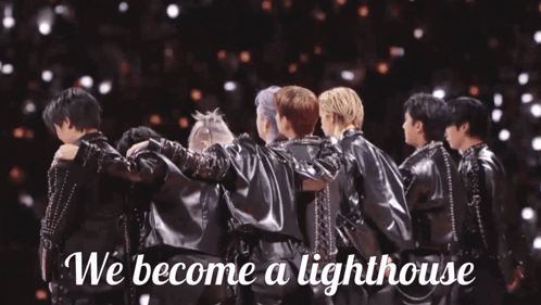 A Group Of Men Huddled Together With The Words " We Become A Lighthouse " On The Bottom GIF