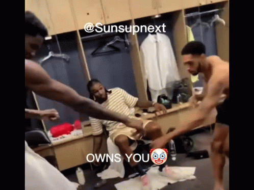 A Group Of Men In A Locker Room With The Caption " Owns You " On The Bottom GIF