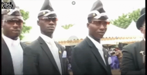 A Group Of Men In Black Suits And White Hats Are Standing Next To Each Other . GIF