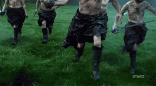 Men In Kilts Running With Swords GIF