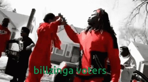 A Group Of Men In Red Jumpsuits Are Giving Each Other A High Five With The Words Billzinga Voters Written In Green GIF