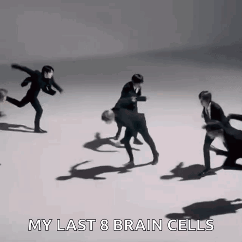 A Group Of Men In Suits Are Dancing On A White Surface With The Words `` My Last 8 Brain Cells '' . GIF