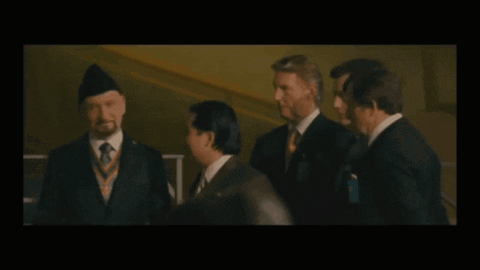 Laughing Men In Suits With Medal GIF